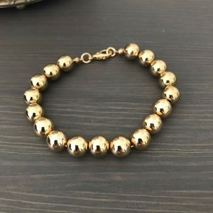 Gold colored ball bracelet beads NWOT